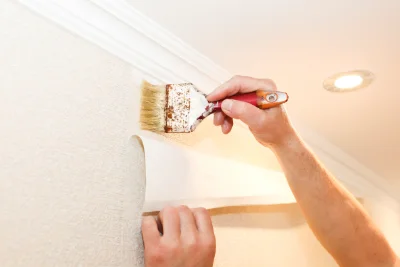 Pose de papier peint aux Molières — revêtements muraux et toiles de verre